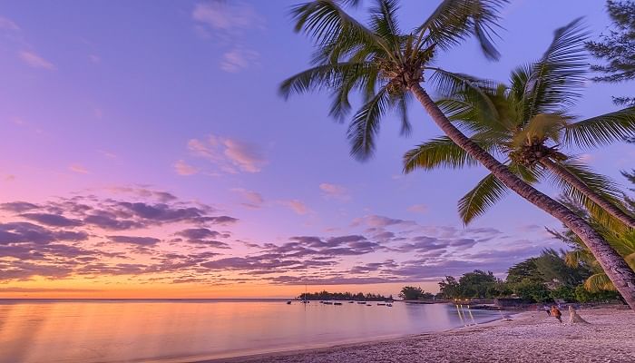 Behold the most enchanting sunsets at Pereybere Beach on your vacation.